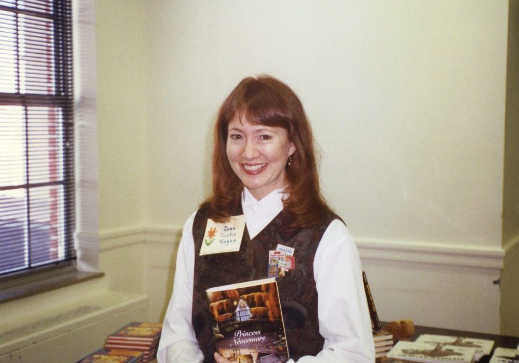 Dian Curtis Regan posing with her books