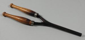 This Marcel curling iron (HF.17.68a) was heated on the fire or stove before wrapping hair around the metal.