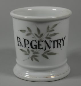 This personalized shaving mug (HF.16.60) was used to store soap pucks and create a lather so the users hands would be clean.